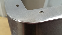 Sample of stainless steel part corner detail finishing by CB Fabricating sheet metal fabricators near Indianapolis, IN